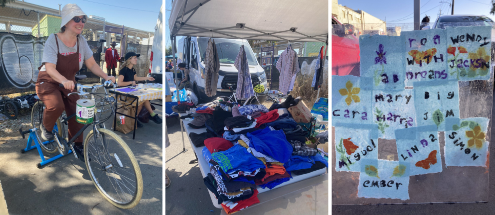 Left image: woman on a stationary bicycle with money can on handlebars. She is outside with the freeway and a graffitied fence behind her and people tabling nearby. Image 2: clothing on table and hanging on display rod under canopy with street and parked cars in bakground. Image 3: handmade paper on clear plexi sheet. paper is white with blue and black letters spelling names and orange, yellow green and purple images of flowers, butterflies and leaves. 